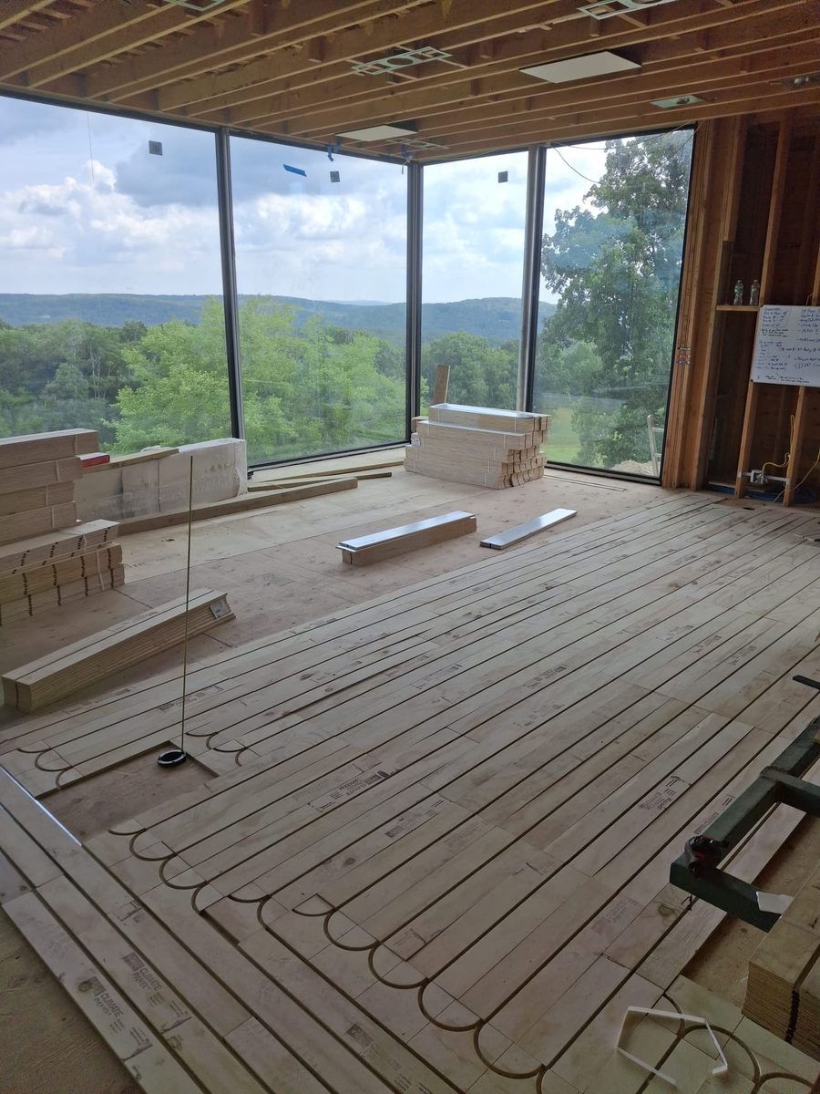 Radiant heated subfloor panels installed in a modern Connecticut home